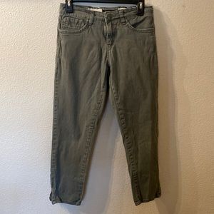 Supplies green skinny jeans with elastic waist size 6